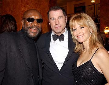 Isaac with John Travolta and Kelly Preston