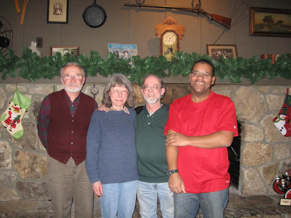 Frank and Elaine (center) with students
