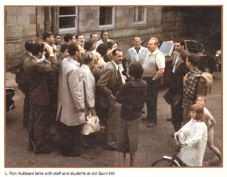 Peter Gillham (in a gray jacket, standing behind LRH) and Peter Jr. (behind Suzette) at Saint Hill in 1962